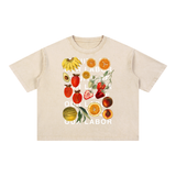 Fruits of Our Labor Tee in light apricot, a pale cream blank where the off-white type reads across the fruit and softens over the bare ground — On The Job Clothing