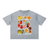 Fruits of Our Labor Tee in light gray, off-white type over the botanical fruit collage holding clear contrast against the blue-grey wash — On The Job Clothing