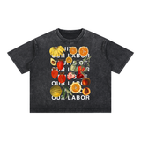 Fruits of Our Labor Tee in black, the campaign name in six lines of off-white type layered over a botanical fruit collage across the chest — On The Job Clothing